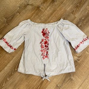 Chambray top with red embroidered detail